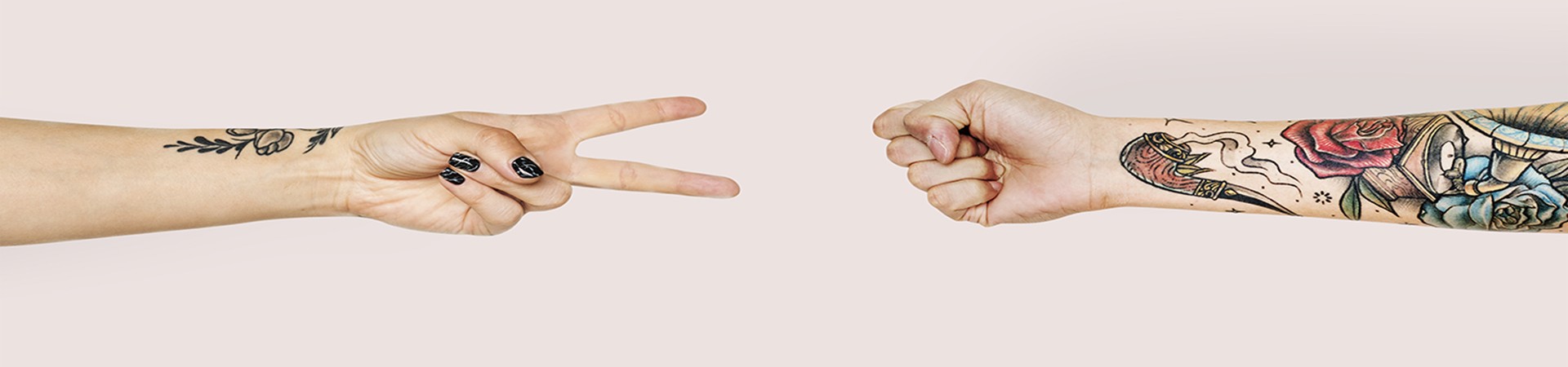 Hands playing rock-paper-scissors